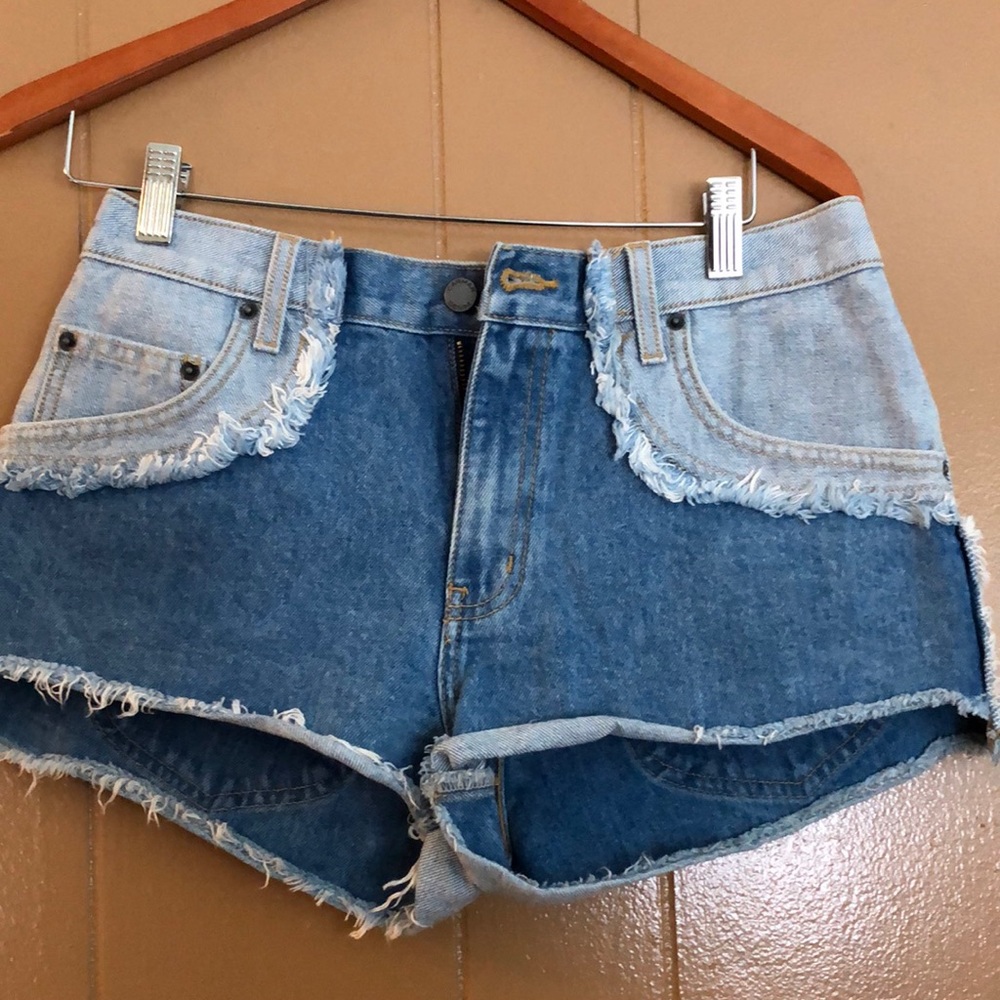 Faded two toned jean shorts.